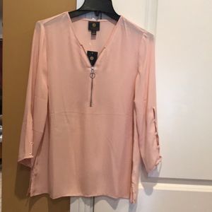 NWT. Beautiful pink long sleeve blouse.